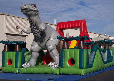 Carrera de obstáculos inflable del dinosaurio jurásico asombroso del superviviente, carrera de obstáculos del niño