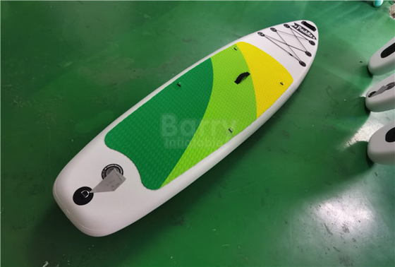 El tablero inflable verde y amarillo modificado para requisitos particulares del SORBO se levanta Paddleboard