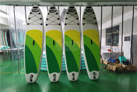 El tablero inflable verde y amarillo modificado para requisitos particulares del SORBO se levanta Paddleboard