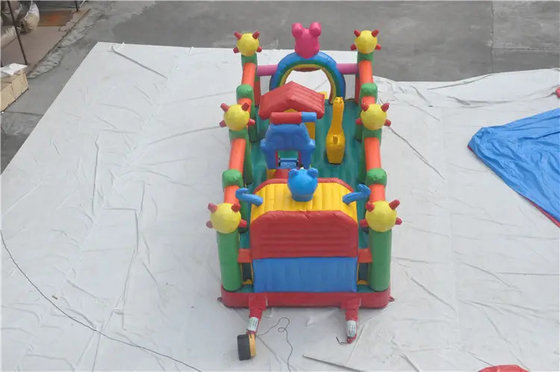 Castillo animoso de salto colorido de la casa inflable de la despedida con la diapositiva para los niños al aire libre