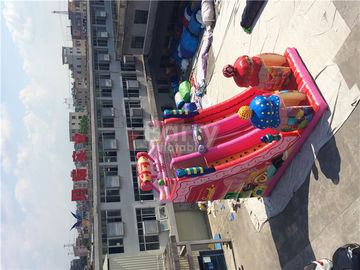 La diapositiva inflable gigante al aire libre del caramelo 0.55m m de la lona rosada del PVC/explota el parque de atracciones