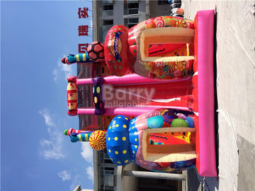 La diapositiva inflable gigante al aire libre del caramelo 0.55m m de la lona rosada del PVC/explota el parque de atracciones