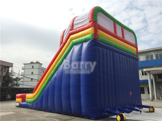 Toboganes acuáticos inflables del carril doble del arco iris de la lona del PVC para el patio de los niños