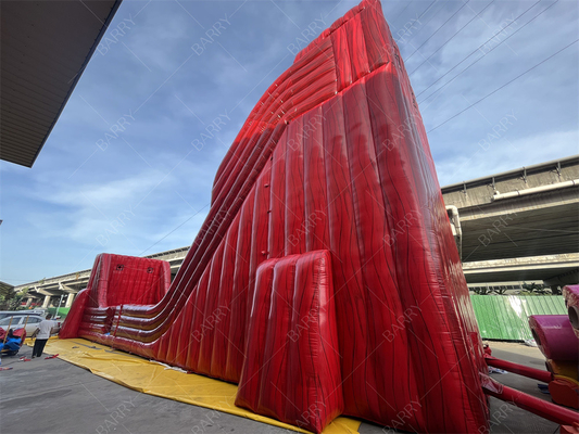 Fábrica personalizada comercial de tobogán de agua gigante rojo emocionante hinchable deslizamiento N Fly zip line juego deportivo