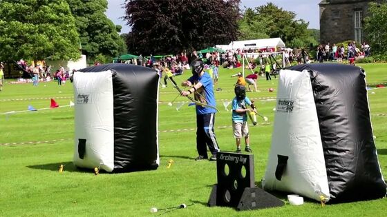 El tiro al arco inflable de las arcones de Paintball marca los obstáculos con etiqueta que tiran juegos