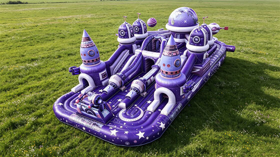 Ciudad de diversión inflable púrpura con temática galáctica | Carrera de obstáculos de la estación espacial con toboganes y túneles | PVC comercial personalizable para festivales y eventos en centros comerciales