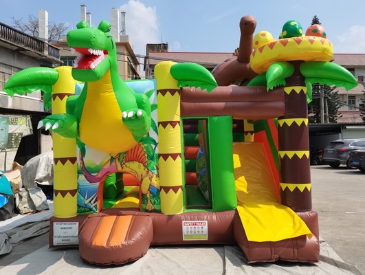 Castillo animoso inflable de encargo con la casa de la despedida del tema de los dinosaurios de la diapositiva para los niños