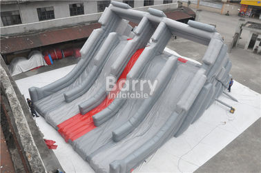 Diapositiva inflable adulta gigante formada cabeza de Deagon con paso detrás