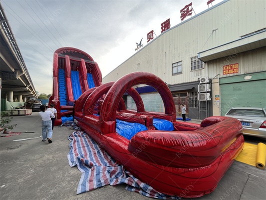 Fábrica personalizada comercial de tobogán de agua gigante rojo emocionante hinchable deslizamiento N Fly zip line juego deportivo